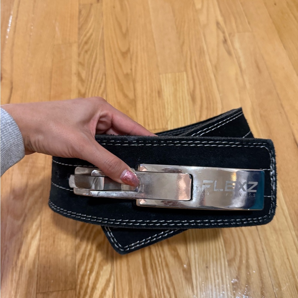 Black Weightlifting Belt with Silver Buckle